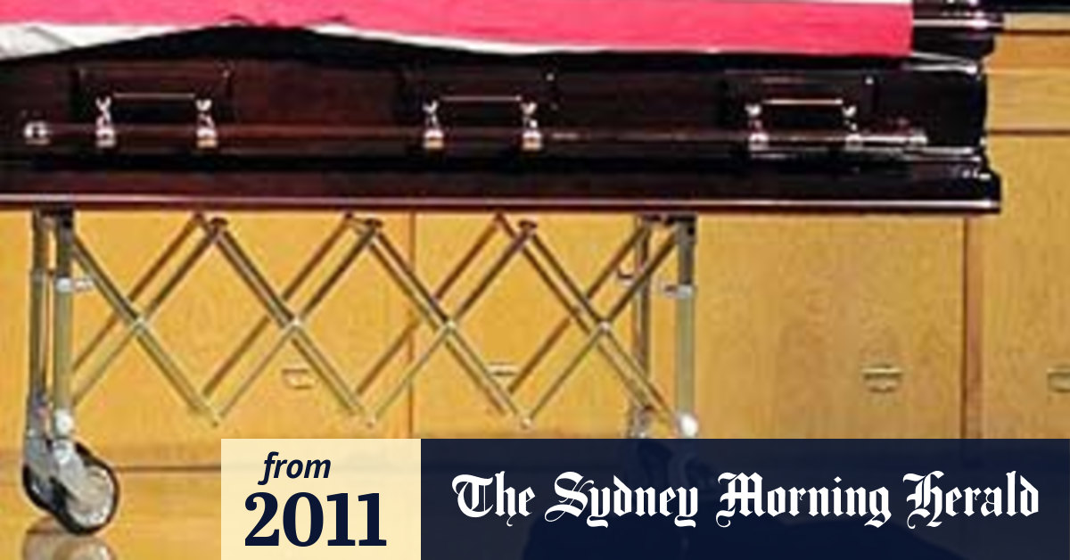 Faithful to the last slain Navy SEAL's dog stays by his side at funeral